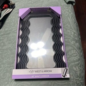 Black Wavy Wall Mirror